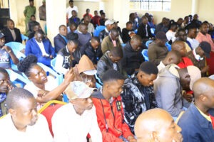 Gen Zs follow Governor Nyaribo's responses to their petition at the West Mugirango CDF Hall in Nyamira Town.