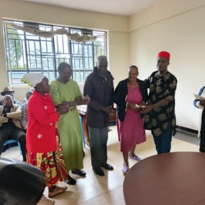 West Mugirango MP Stephen Mogaka issuing a cheque to one of the women's self-help groups during the relaunch of the Uwezo Fund in West Mugirango Constituency. Photo/Arnold Ageta.