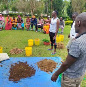 Dominic Orina teaches parents modern farming skills, using containers to grow vegetables, to improve their nutrition and adapt to climate change.