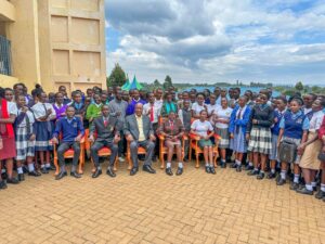 Governor Amos Nyaribo takes a photo with Form Four students who are in a one-week mentorship program at Nyambaria Boys. This is a section of the 731 secondary school students who are under the county's scholarship program.