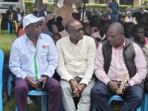 The UPA Chief Coordinator, John Nyamboga, Senatorial aspirant Philemon Apiemi, and Bogichora Ward aspirant, Douglas Onkeo, at a funeral in Rangenyo village, where they donated a wheelchair to a child living with a disability. Photo/Arnold Ageta