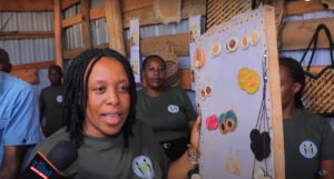 Askah Nyakwara explained some of the products her group produces from banana fibers to the guests who visited the group at their Kemera offices.