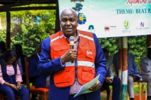 Dr. John Matiang'i, Nyamira County CEC for Environment, Climate Change, Energy, and Natural Resources, addressing the public during World Environment Day at Jamuhuri Gardens in Nyamira town. He represented Governor Nyaribo in celebrating the day, which saw market cleanups in all sub-counties.
