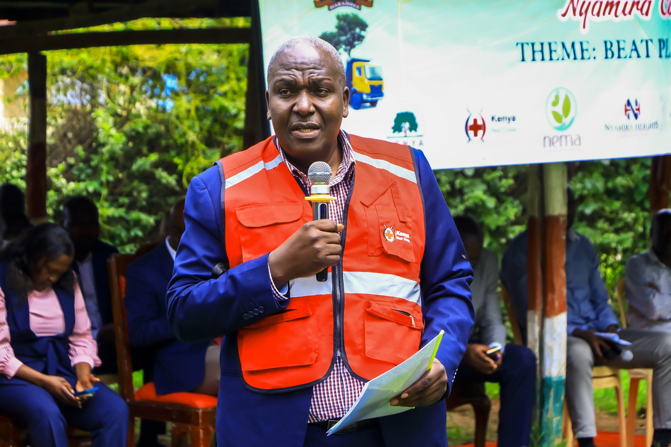 Dr. John Matiang'i, Nyamira County CEC for Environment, Climate Change, Energy, and Natural Resources, addressing the public during World Environment Day at Jamuhuri Gardens in Nyamira town. He represented Governor Nyaribo in celebrating the day, which saw market cleanups in all sub-counties.