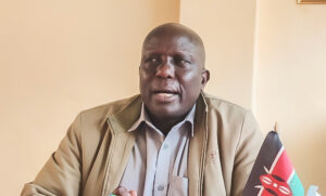 Nyamira Branch KNUT Executive Secretary Evans Obiri addresses the media in his office. He has faulted the government's plan to halt school capitation that funds free basic education. Photo/Arnold Ageta.