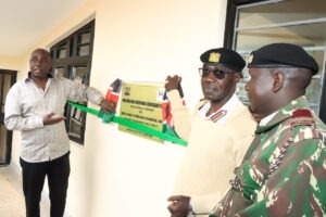 North Mugirango MP Joash Nyamoko, Nyamira County Deputy Commissioner Simon Osumba, and Magwagwa Assistant County Commissioner Moses Ole Sit officially open the new Magwagwa Division headquarters, which was built through the NG-CDF.
