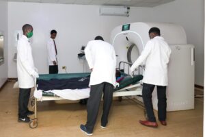Health workers at Nyamira County Referral Hospital attend to a patient using the CT scan machine. The facility performed a total of 5,939 CT scans in 2025. Photo: Governor’s Press Service