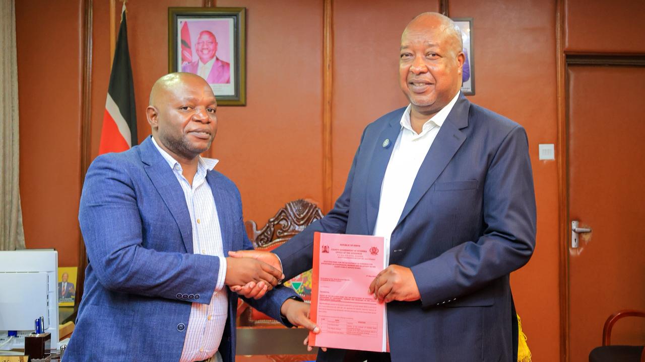 Nyamira Governor HE Amos Nyaribo receives a report from the select panel that was tasked to shortlist and interview members for Nyamira County Public Service Board.
