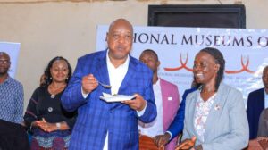 Governor Amos Nyaribo tastes an indigenous vegetable meal during the launch of the indigenous vegetables school feeding programme at Kebirigo Boys Secondary School. Photo/Arnold Ageta