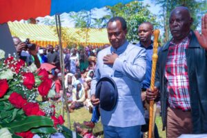 West Mugirango MP Stephen Mogaka pays his last respects to Richoni Mayaka during his funeral service at Nyakeore. Richoni was one of the most popular radio fans in the Gusii region. Photo/Arnold Ageta