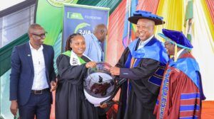 Nyamira Governor Amos Nyaribo hands over a toolkit to a Vocational Training Center (VTC) graduate. A total of 149 graduands received the equipment for their exemplary performance during training. Photo/Arnold Ageta