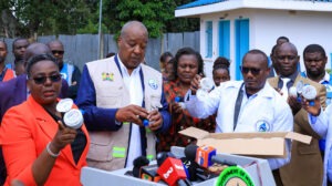 LVSWDA Chief Executive Officer Jackline Momanyi and Governor Amos Nyaribo inspect the newly delivered smart water meters at the NYAWASCO offices in Nyamira. Photo/Arnold Ageta